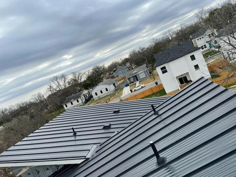 Standing seam metal roof panels with vents for Skylight Repair in Clarkson